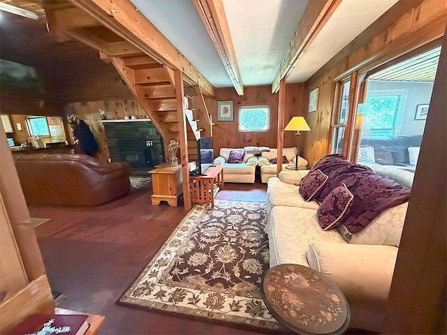 422/431 Little Rutland Rd, Castleton, VT 05735 - living room featuring wood walls, a fireplace, and wood finished floors