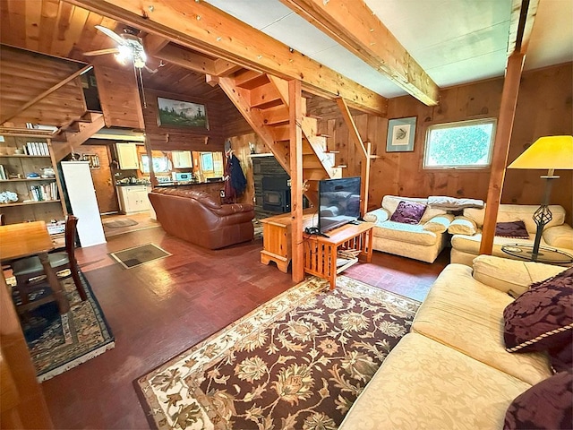 422/431 Little Rutland Rd, Castleton, VT 05735 - living area with wood walls, stairway, wood finished floors, ceiling fan, and beamed ceiling