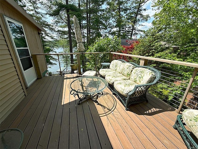 422/431 Little Rutland Rd, Castleton, VT 05735 - wooden terrace with an outdoor living space and a water view