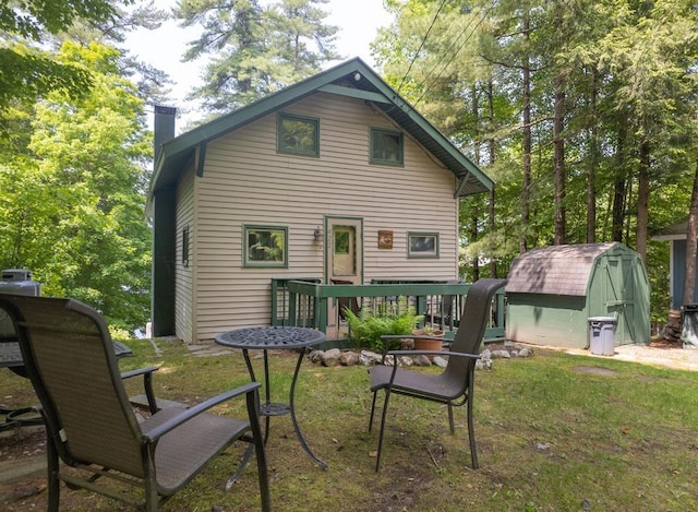 422/431 Little Rutland Rd, Castleton, VT 05735 - rear view of house with a chimney and a yard