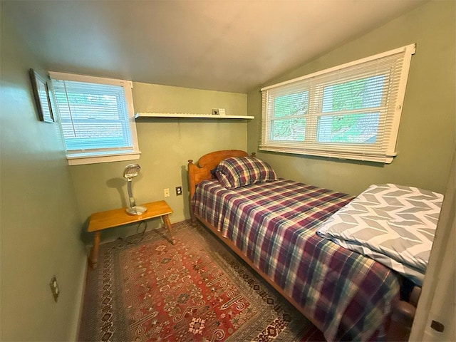 422/431 Little Rutland Rd, Castleton, VT 05735 - bedroom featuring lofted ceiling and multiple windows