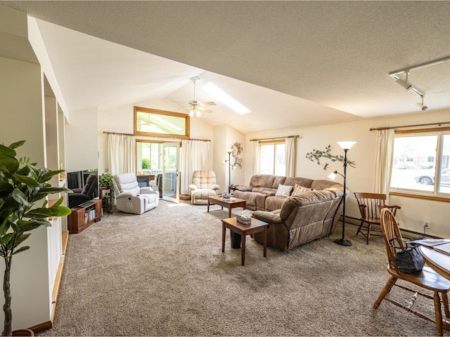115 Meadow Run Rd, Williston, VT 05495 - carpeted living room with vaulted ceiling, healthy amount of natural light, a ceiling fan, and rail lighting