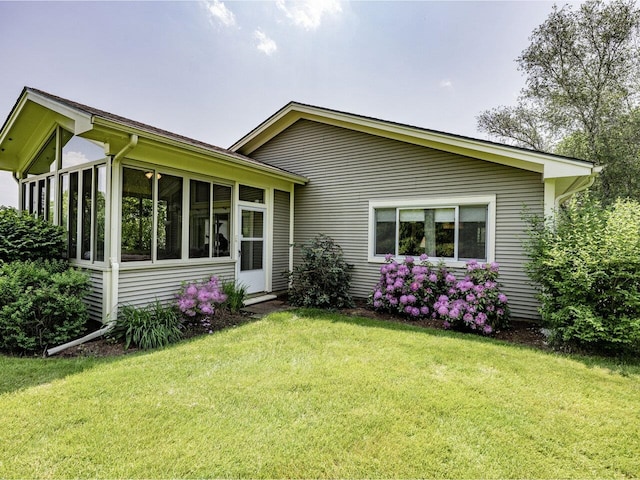 115 Meadow Run Rd, Williston, VT 05495 - single story home featuring a front lawn and a sunroom