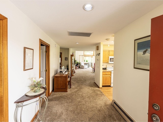 115 Meadow Run Rd, Williston, VT 05495 - hall with light colored carpet and a baseboard radiator