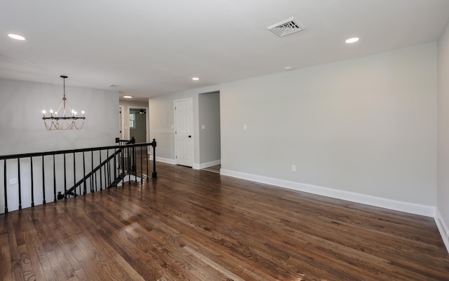 21 Ridgefield Dr, Milford, NH 03055 - empty room featuring a chandelier, baseboards, recessed lighting, and dark wood-style flooring