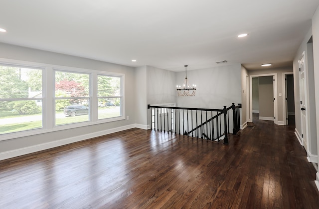 21 Ridgefield Dr, Milford, NH 03055 - unfurnished room with a chandelier, dark wood-style floors, recessed lighting, and baseboards