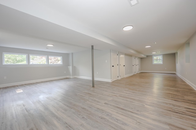 21 Ridgefield Dr, Milford, NH 03055 - below grade area featuring light wood-style flooring, baseboards, and recessed lighting
