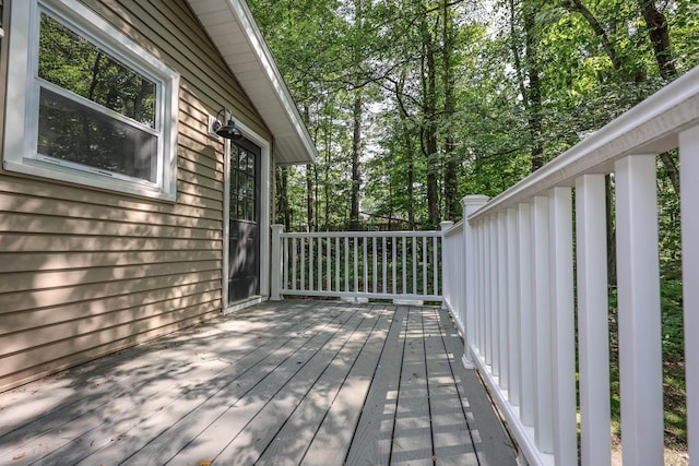 21 Ridgefield Dr, Milford, NH 03055 - wooden deck featuring view of wooded area
