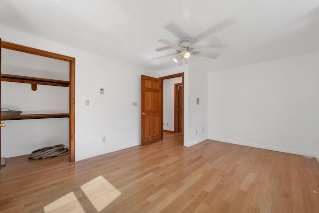 5 Lucerne Dr, Madison, NH 03849 - unfurnished bedroom with light wood finished floors, ceiling fan, baseboards, and a closet