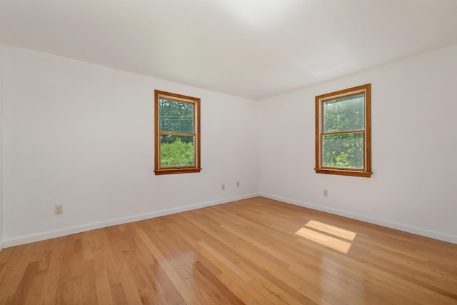 5 Lucerne Dr, Madison, NH 03849 - spare room featuring healthy amount of natural light, light wood finished floors, and baseboards