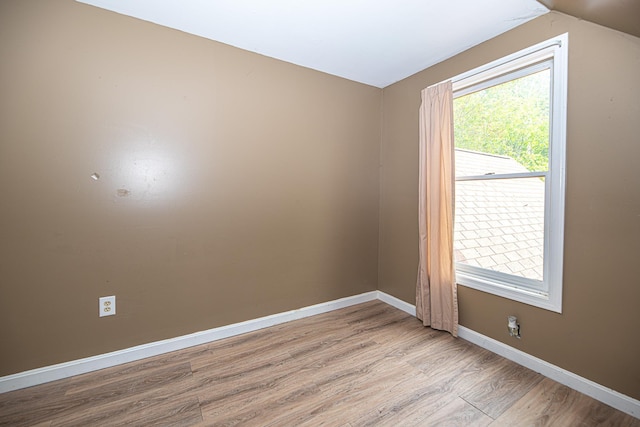 20 Locke Hill Ln, Barrington, NH 03825 - unfurnished room featuring light wood-style floors, lofted ceiling, and baseboards