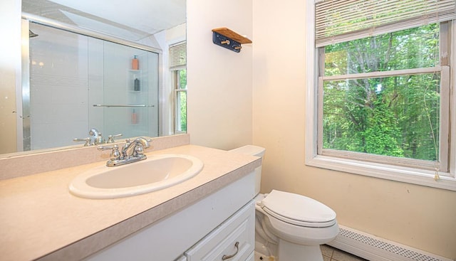 20 Locke Hill Ln, Barrington, NH 03825 - bathroom with a baseboard heating unit, healthy amount of natural light, vanity, and an enclosed shower