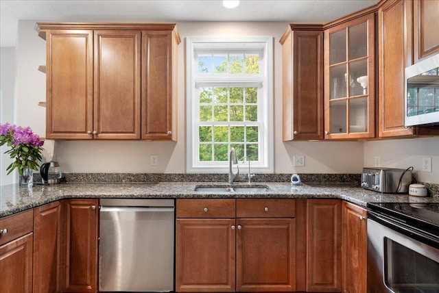 6 Samuels Ct, Dunbarton, NH 03046 - kitchen featuring stainless steel appliances, healthy amount of natural light, a sink, and brown cabinets