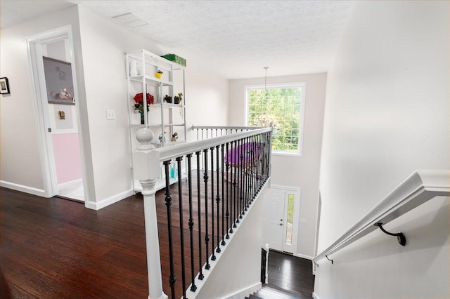6 Samuels Ct, Dunbarton, NH 03046 - staircase featuring wood finished floors, baseboards, and a textured ceiling