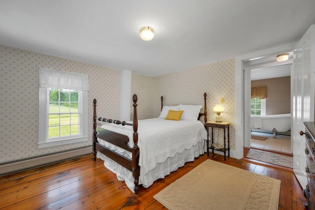 196 Deering Center Rd, Weare, NH 03281 - bedroom featuring hardwood / wood-style floors and a baseboard radiator