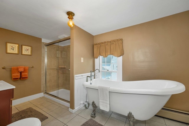 196 Deering Center Rd, Weare, NH 03281 - full bathroom featuring baseboard heating, a stall shower, a soaking tub, vanity, and tile patterned floors