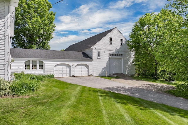 196 Deering Center Rd, Weare, NH 03281 - traditional-style house with driveway, a front lawn, a garage, and a shingled roof