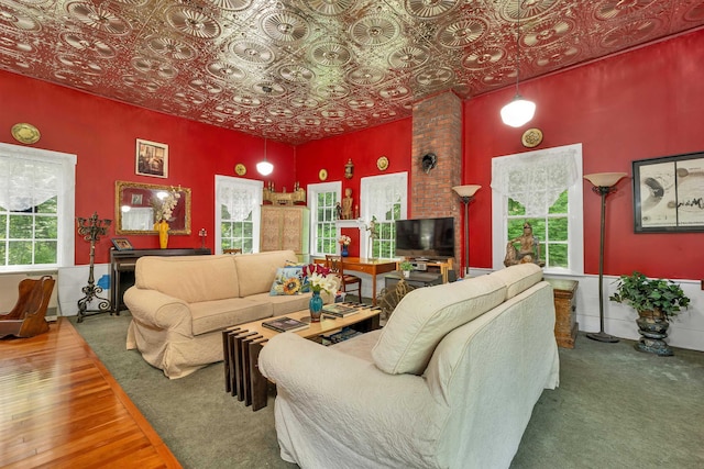 10 Whiteface Rd, Sandwich, NH 03259 - living area with an ornate ceiling, plenty of natural light, and wood finished floors