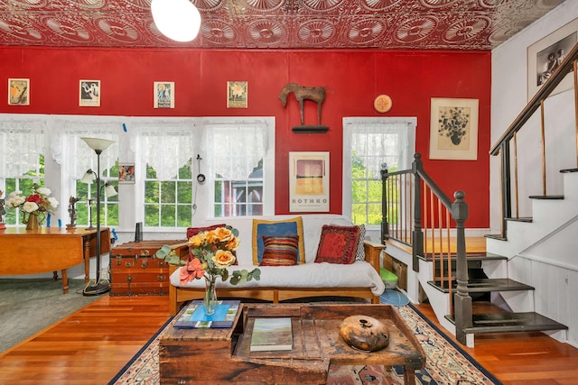 10 Whiteface Rd, Sandwich, NH 03259 - living room with an ornate ceiling, wood-type flooring, and stairs