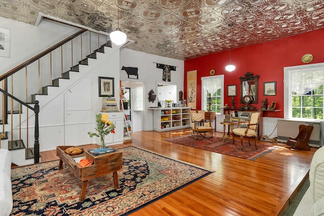 10 Whiteface Rd, Sandwich, NH 03259 - living room with an ornate ceiling, wood finished floors, and stairs