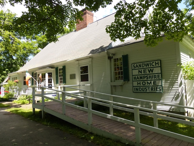 10 Whiteface Rd, Sandwich, NH 03259 - view of front facade with a chimney and roof with shingles