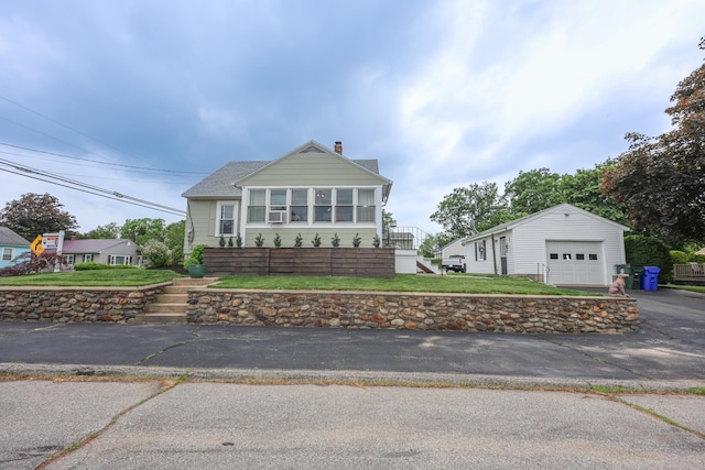 864 Cilley Rd, Manchester, NH 03103 - view of front of property with a chimney and asphalt driveway