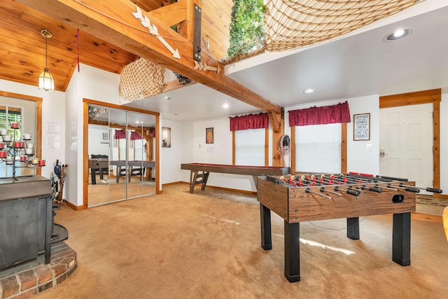 7 Acorn Dr, Alton, NH 03810 - rec room with baseboards, carpet floors, a wood stove, and recessed lighting