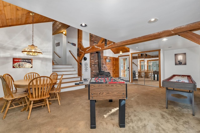 7 Acorn Dr, Alton, NH 03810 - rec room featuring carpet flooring, recessed lighting, beam ceiling, and a wood stove