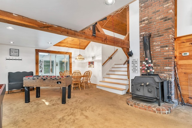 7 Acorn Dr, Alton, NH 03810 - playroom with carpet floors, a wood stove, and recessed lighting