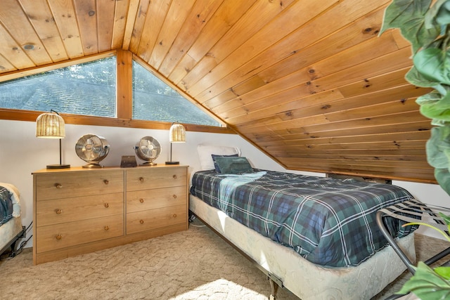 7 Acorn Dr, Alton, NH 03810 - carpeted bedroom with lofted ceiling, wood ceiling, and multiple windows