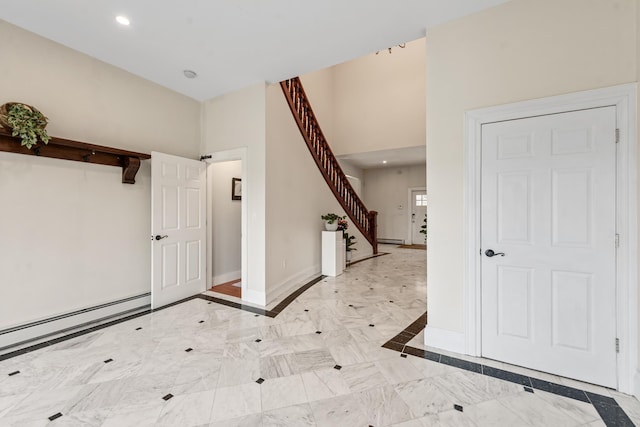 33 Winterberry Ln, Plymouth, NH 03264 - entryway with baseboards, stairway, recessed lighting, a baseboard heating unit, and a high ceiling