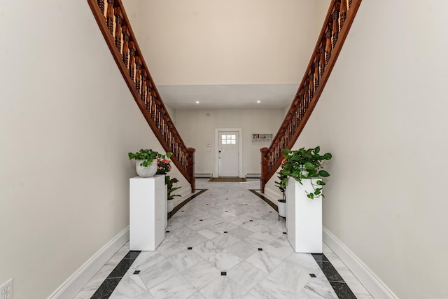 33 Winterberry Ln, Plymouth, NH 03264 - entrance foyer featuring stairs, baseboards, a baseboard radiator, light marble finish flooring, and a high ceiling