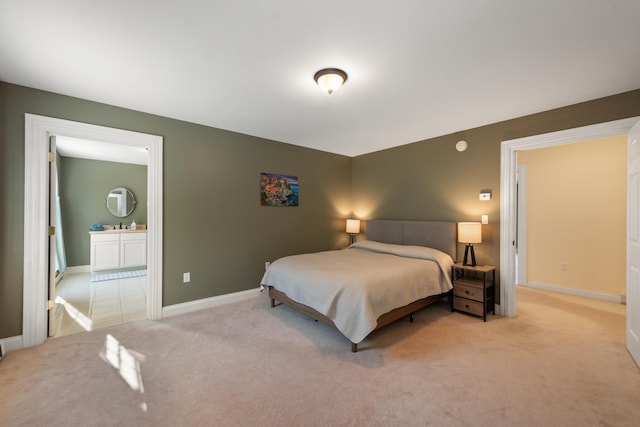 33 Winterberry Ln, Plymouth, NH 03264 - bedroom featuring light carpet, baseboards, and connected bathroom
