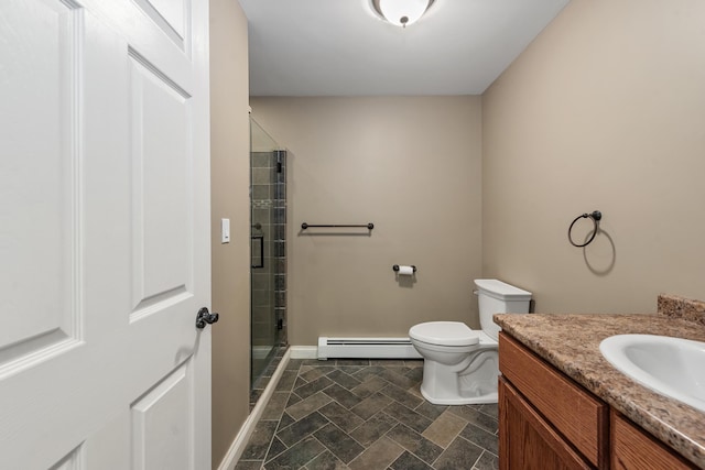 33 Winterberry Ln, Plymouth, NH 03264 - bathroom featuring a baseboard radiator, a shower stall, toilet, vanity, and stone finish flooring