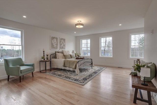 338 Pine Hill Rd, Hollis, NH 03049 - bedroom with light wood-style floors, baseboards, and recessed lighting