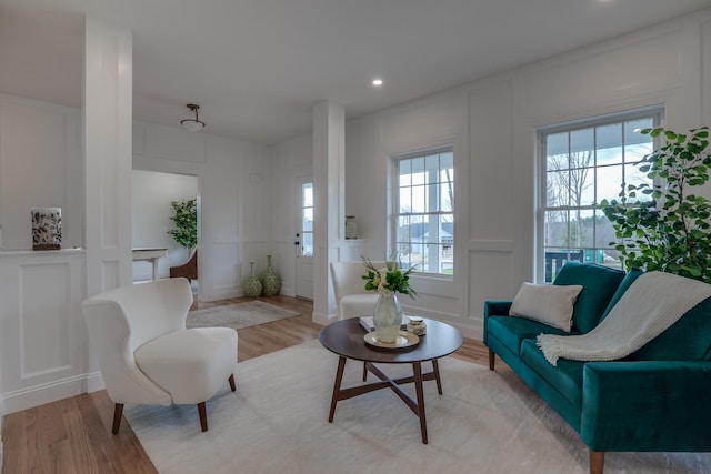 338 Pine Hill Rd, Hollis, NH 03049 - living room with a decorative wall, light wood-style flooring, healthy amount of natural light, and recessed lighting