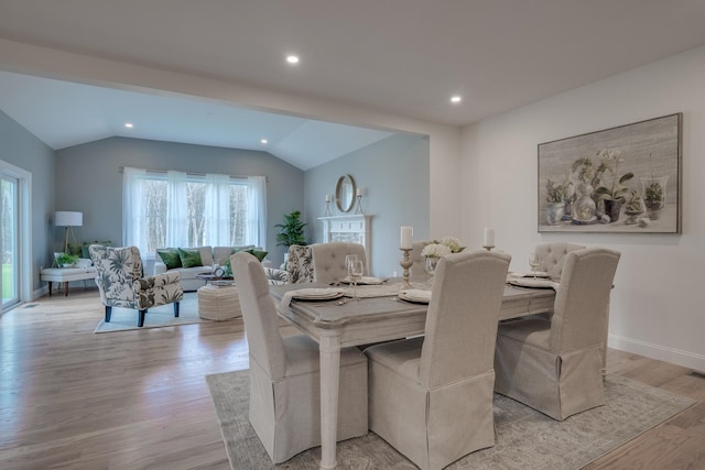 338 Pine Hill Rd, Hollis, NH 03049 - dining area with vaulted ceiling, light wood finished floors, recessed lighting, and baseboards