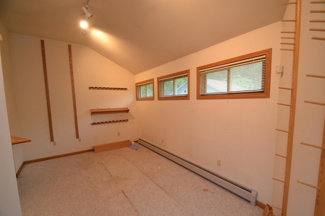 296 Atwood Rd, Duxbury, VT 05676 - empty room featuring a baseboard radiator and vaulted ceiling