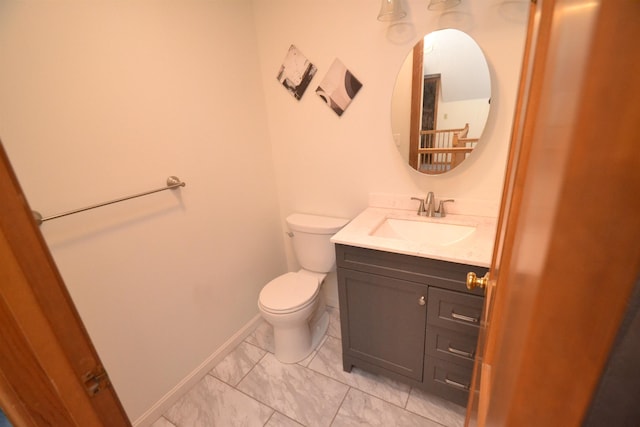 296 Atwood Rd, Duxbury, VT 05676 - half bath featuring toilet, vanity, marble finish flooring, and baseboards