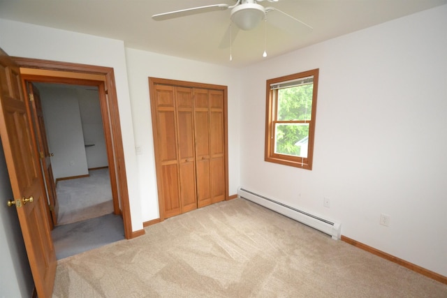 296 Atwood Rd, Duxbury, VT 05676 - unfurnished bedroom with a baseboard heating unit, carpet flooring, a closet, and baseboards