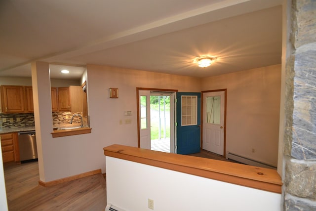 296 Atwood Rd, Duxbury, VT 05676 - foyer featuring baseboard heating, light wood-style flooring, baseboards, and recessed lighting