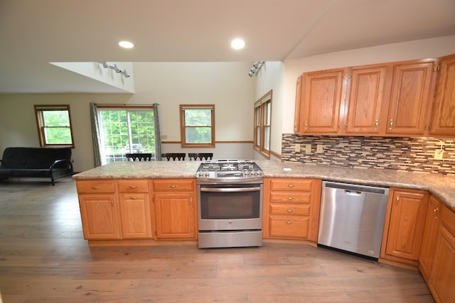 296 Atwood Rd, Duxbury, VT 05676 - kitchen with stainless steel appliances, a peninsula, recessed lighting, tasteful backsplash, and light wood-type flooring