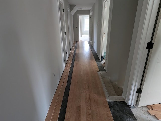 LOT7-3 Sanborn Mdw Unit 7-3, Fremont, NH 03044 - corridor with wood finished floors