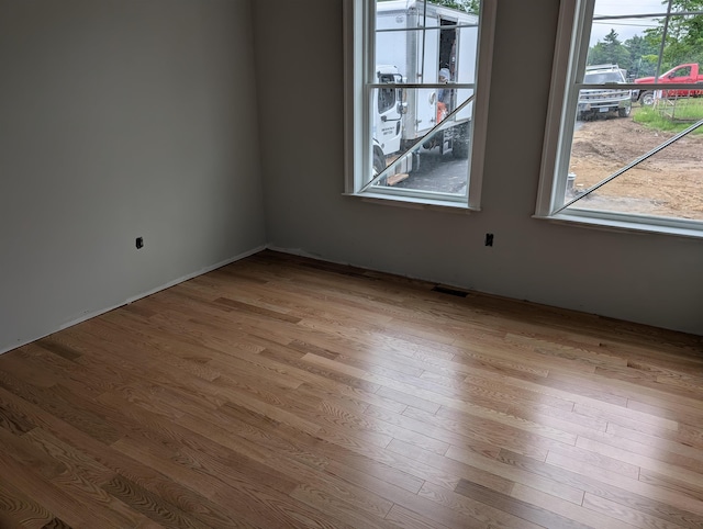 LOT7-3 Sanborn Mdw Unit 7-3, Fremont, NH 03044 - unfurnished room featuring wood finished floors
