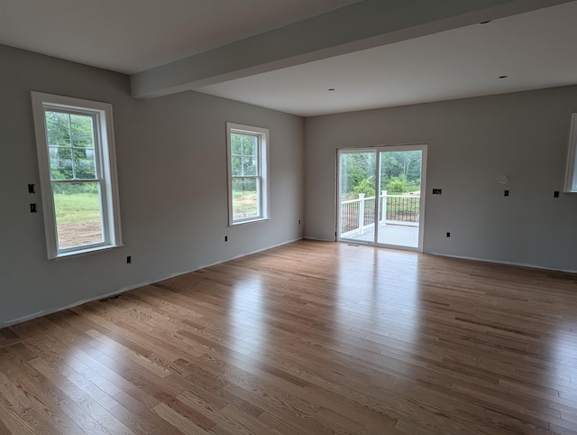 LOT7-3 Sanborn Mdw Unit 7-3, Fremont, NH 03044 - empty room featuring wood finished floors and baseboards