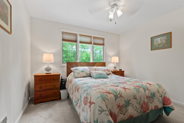 180 Ash St, Conway, NH 03860 - carpeted bedroom with baseboards and ceiling fan