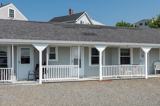 522 Ocean Blvd Unit 10, Hampton, NH 03842 - view of front of property with covered porch and roof with shingles