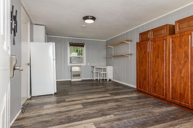 522 Ocean Blvd Unit 10, Hampton, NH 03842 - unfurnished living room with wood finished floors, crown molding, and baseboards