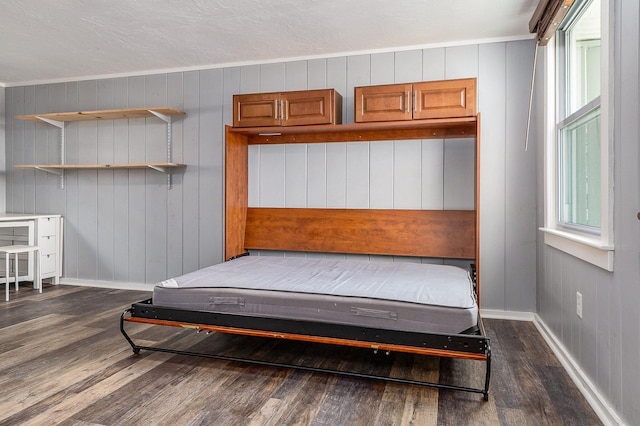 522 Ocean Blvd Unit 10, Hampton, NH 03842 - bedroom with dark wood-style flooring and baseboards
