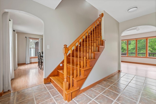 290 Cornish Tpke, Newport, NH 03773 - stairway featuring arched walkways, plenty of natural light, and baseboards